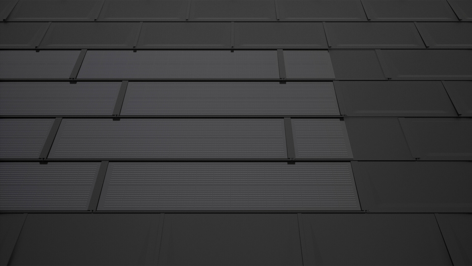 PREFA napelemes tetőlemezek fekete színben, kiegészítő lemezekkel. Ezek négyszögletes modulfelületet biztosítanak, és hozzájárulnak a napelemes tető harmonikus összképéhez.