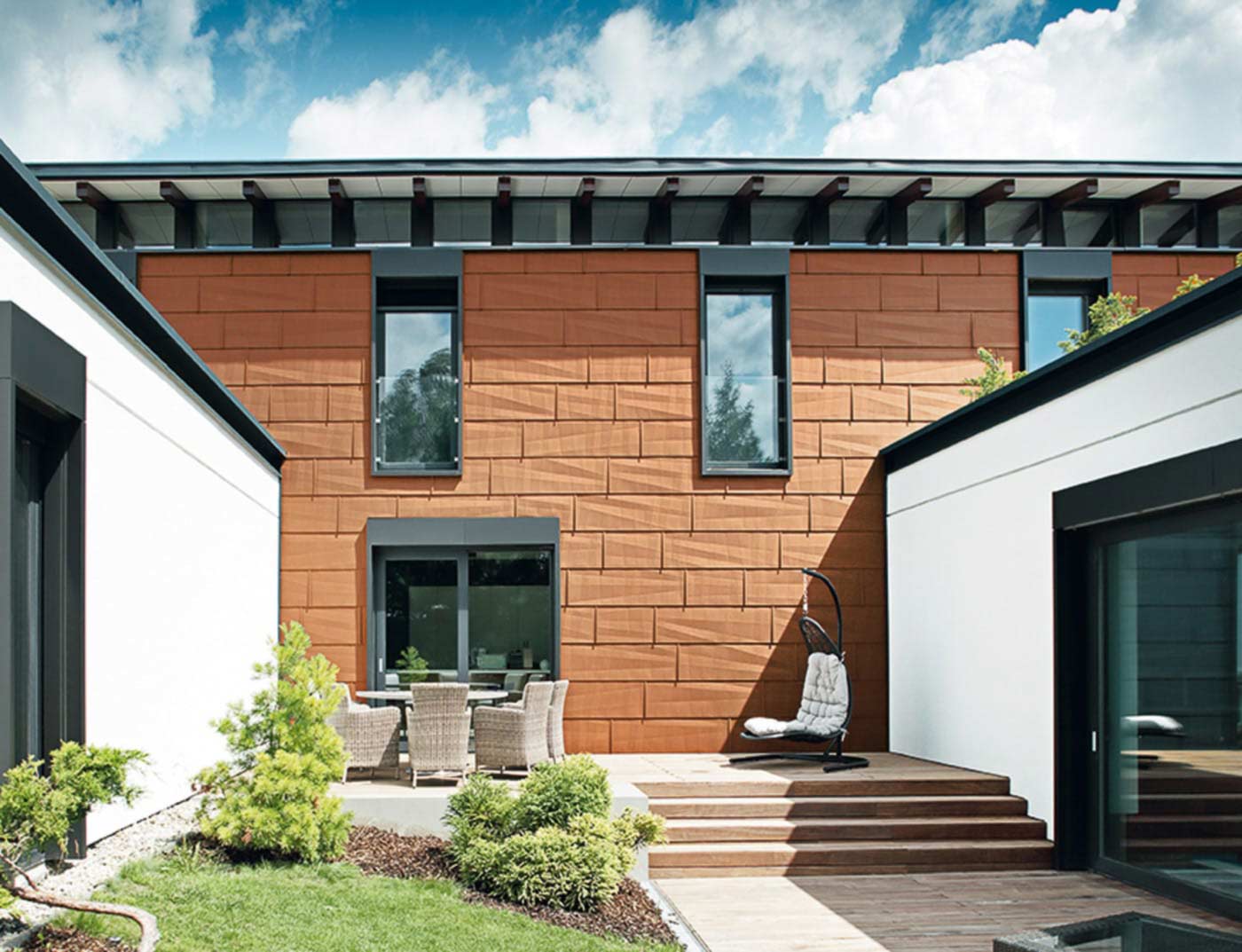 Referencia épületek PREFA Homlokzatburkolati rendszerek FX.12-es homlokzatburkoló panel 04 P.10 téglavörös